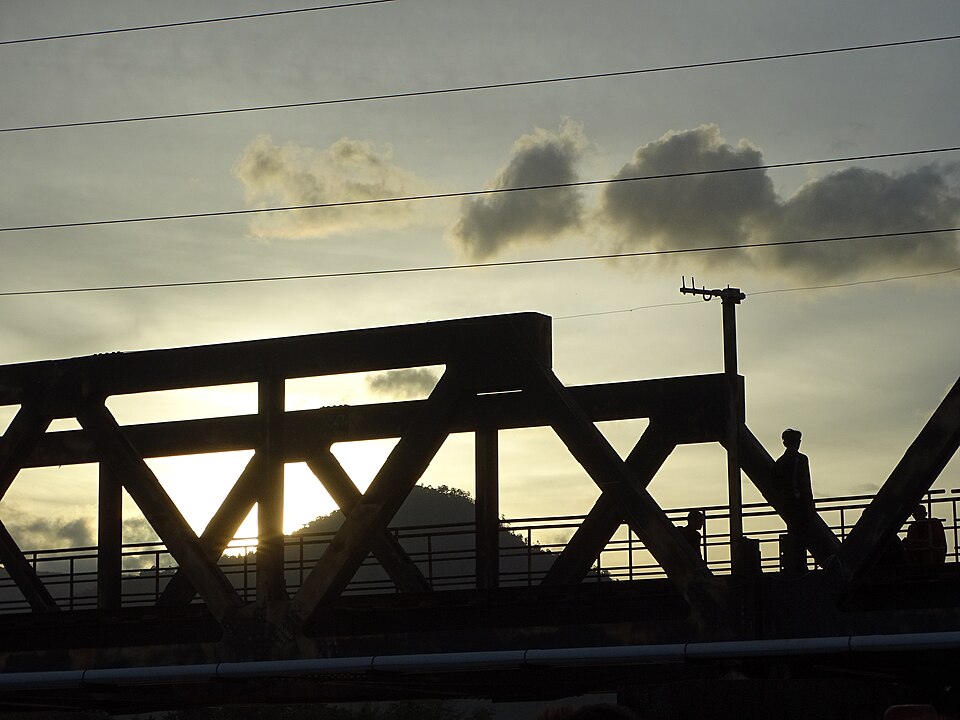 A bridge spanning the river in Kampot, Cambodia